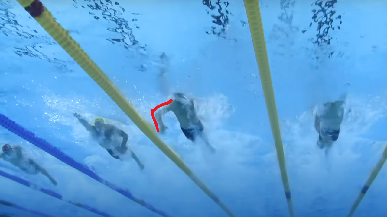 David Popovici's freestyle technique analysis from 2025 World Championships showing perfect high elbow catch position